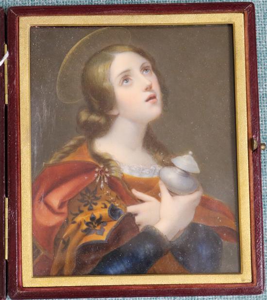 A 19th century leather framed miniature portrait of a Saint